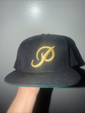 Primitive Black Snapback Hat with Gold 'P' Logo
